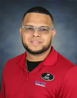 Staff member Jesus O. from ID_65a7bb