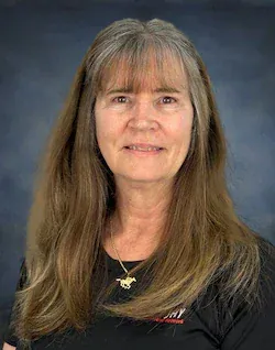 Staff member Teresa B. from ID_7458e6