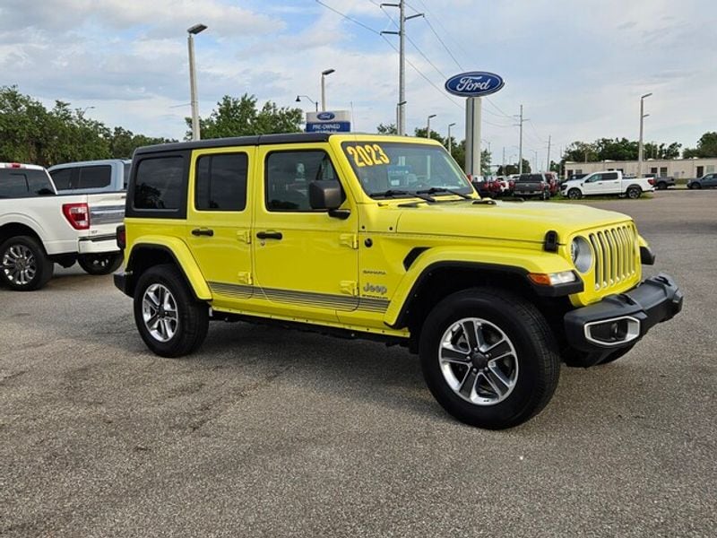 Used 2023 Jeep Wrangler 4-Door Sahara with VIN 1C4HJXEN0PW529789 for sale in Wauchula, FL