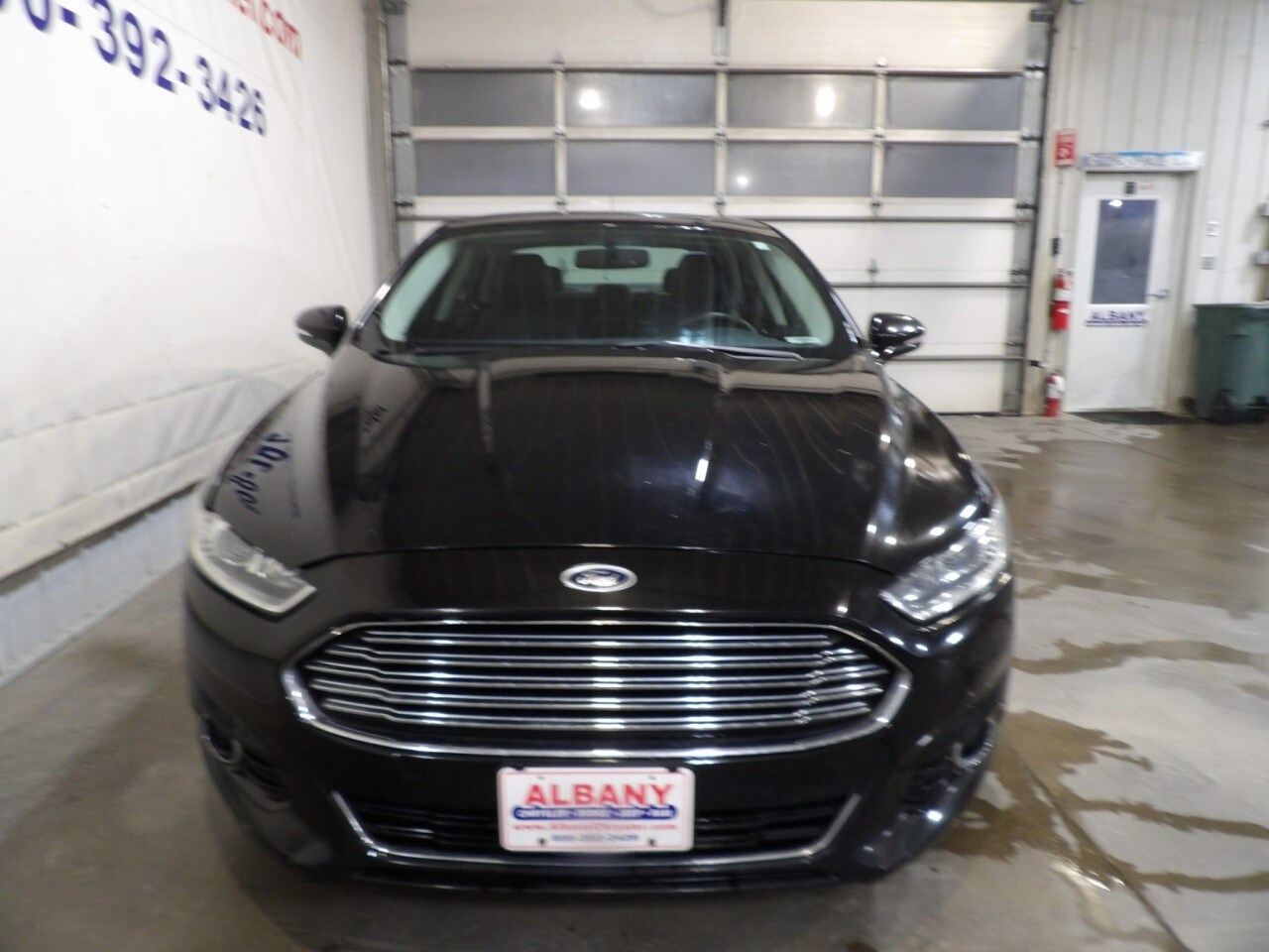 Used 2016 Ford Fusion Titanium with VIN 3FA6P0K98GR118928 for sale in Albany, Minnesota