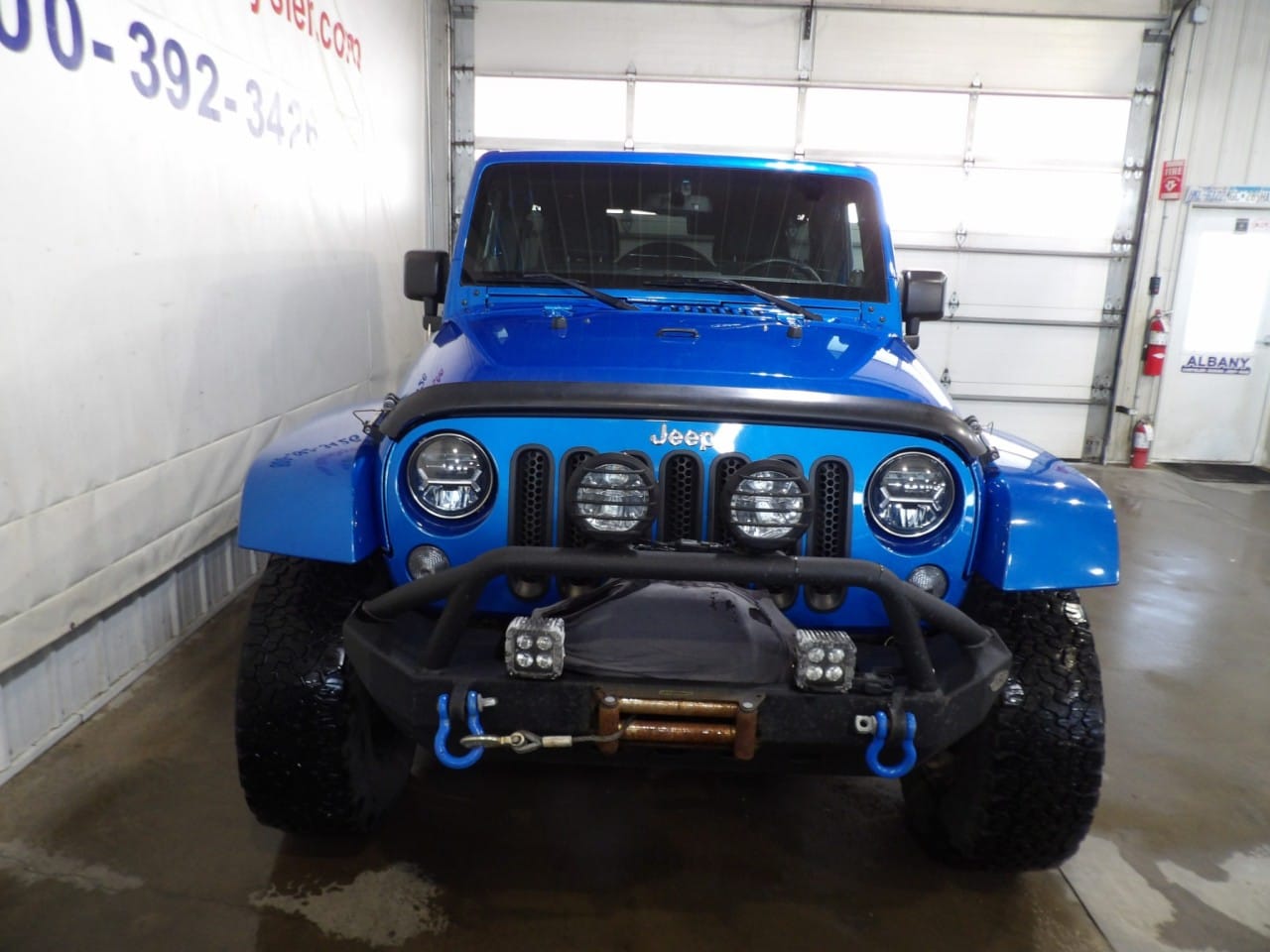 Used 2014 Jeep Wrangler Unlimited Sahara with VIN 1C4BJWEG3EL317243 for sale in Albany, Minnesota