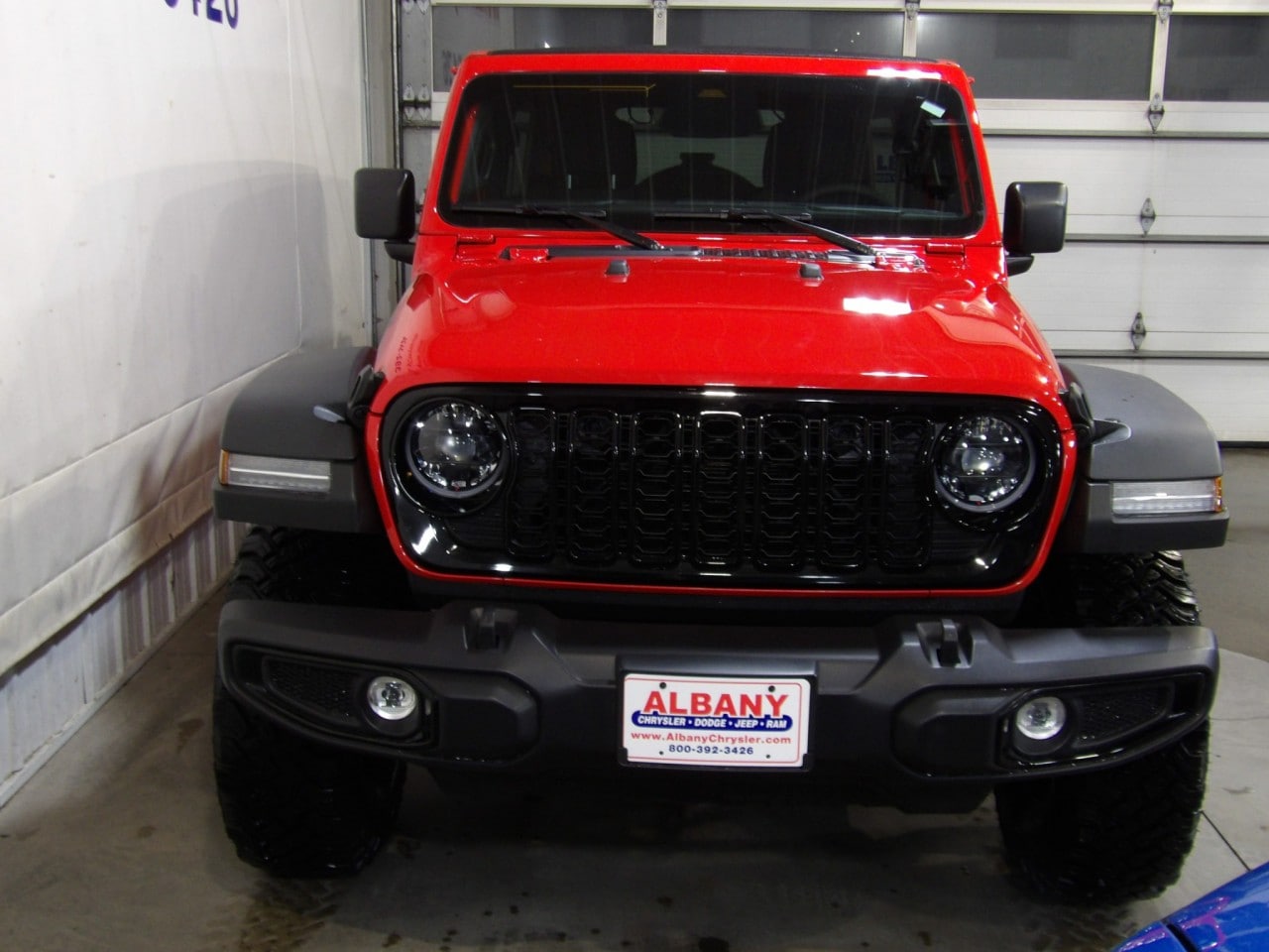 Certified 2025 Jeep Wrangler 4-Door Willys with VIN 1C4PJXDN3SW614874 for sale in Albany, Minnesota