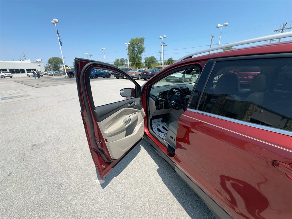 Used 2015 Ford Escape Titanium with VIN 1FMCU0JX0FUA06990 for sale in Fremont, OH