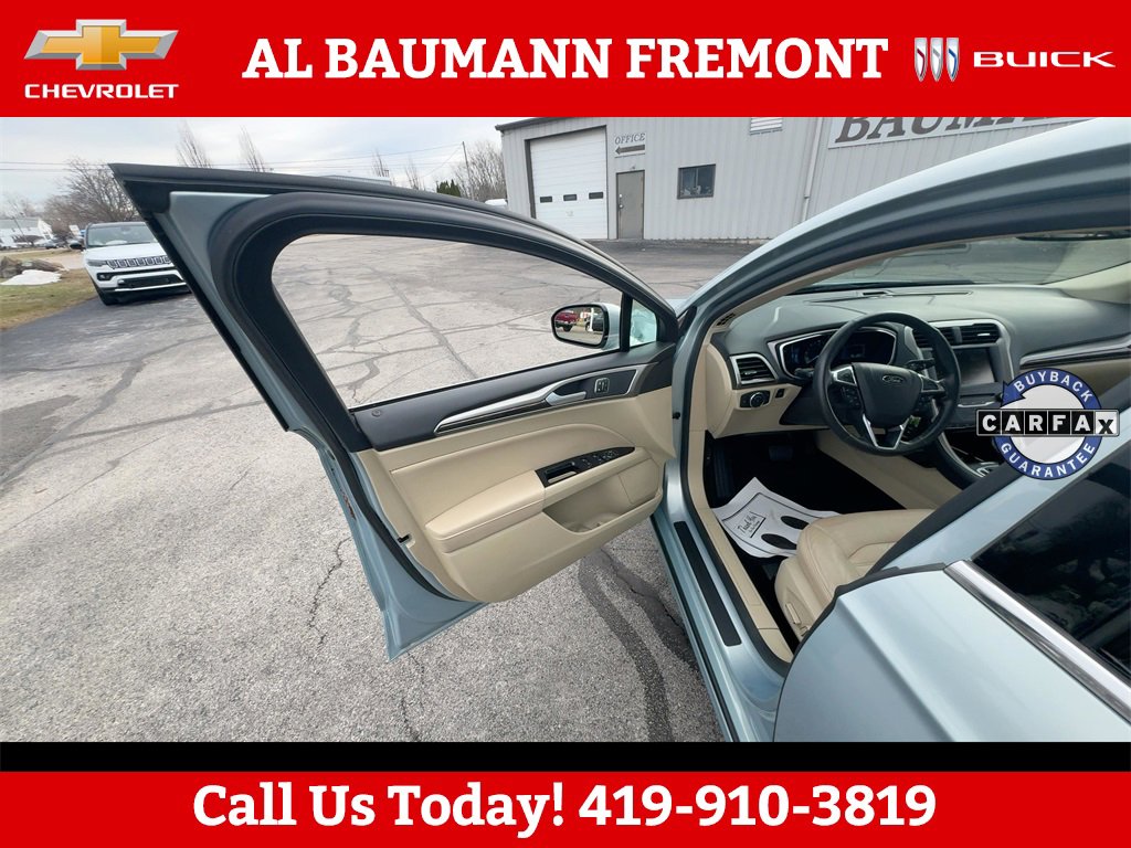 Used 2014 Ford Fusion SE Hybrid with VIN 3FA6P0LU3ER267456 for sale in Fremont, OH