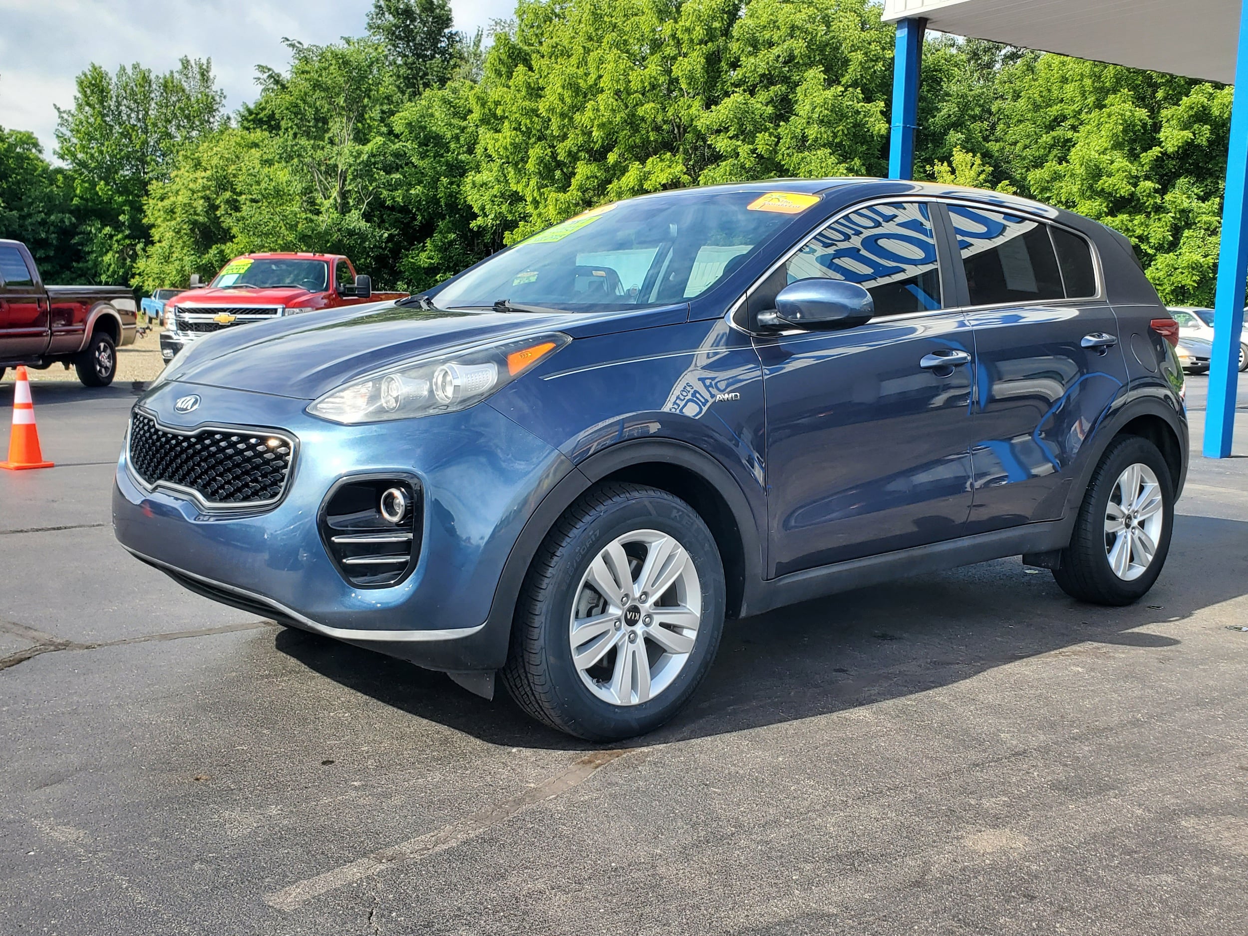 Used 2018 Kia Sportage LX with VIN KNDPMCACXJ7371611 for sale in Albion, MI