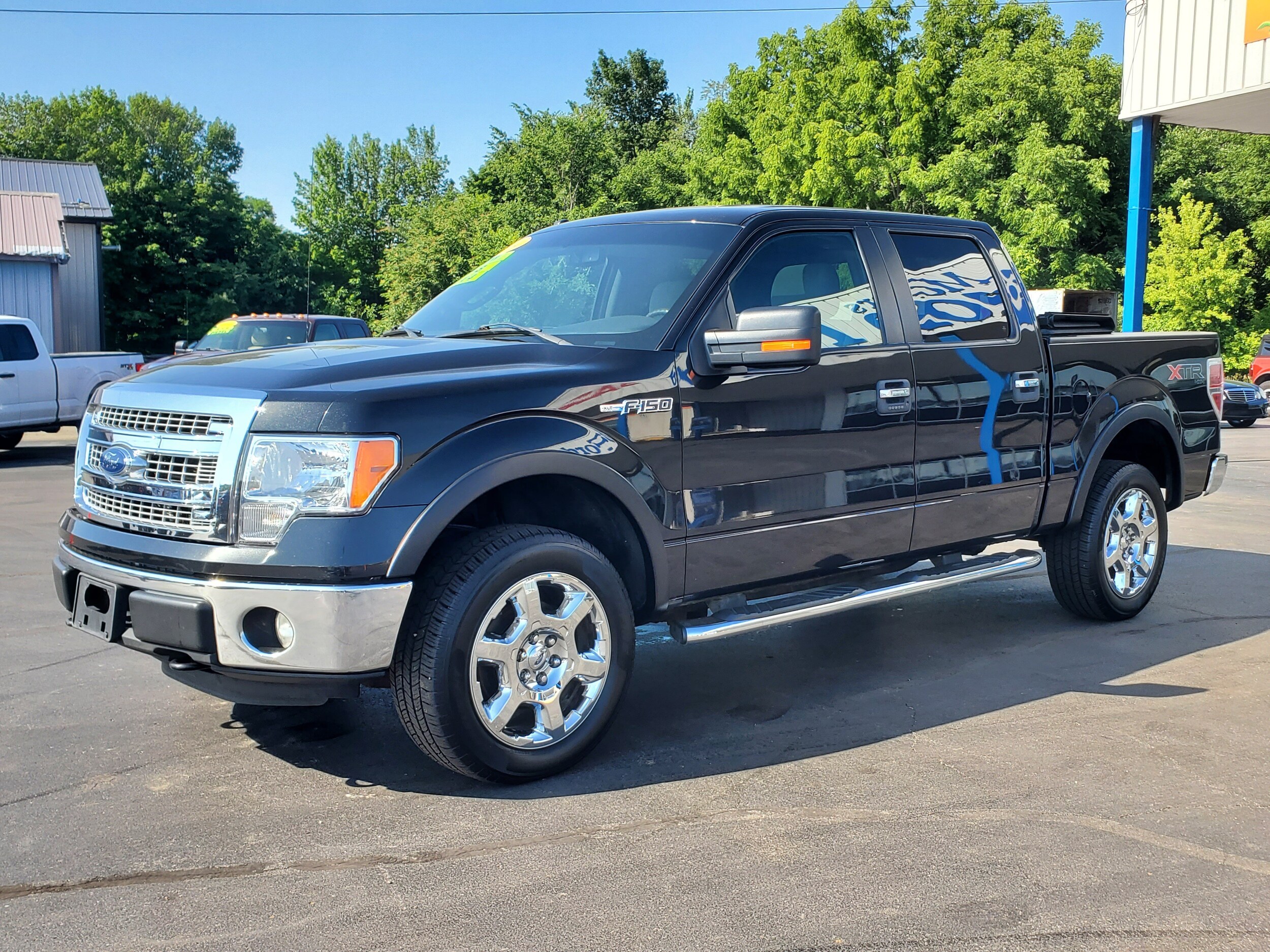 Used 2014 Ford F-150 XLT with VIN 1FTFW1EF3EKD34711 for sale in Albion, MI