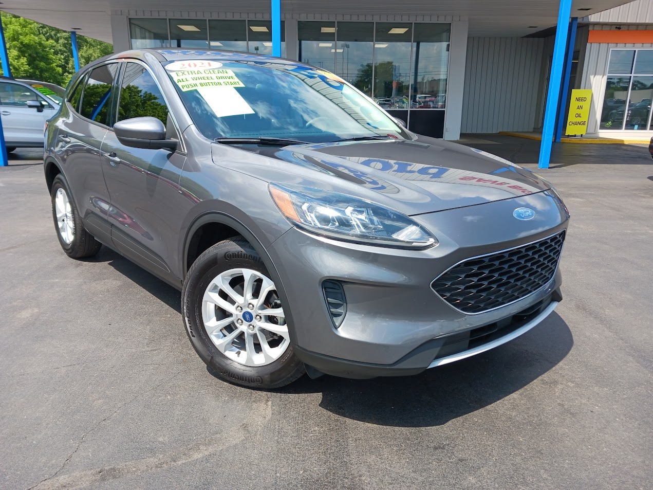 Used 2021 Ford Escape SE with VIN 1FMCU9G65MUA39810 for sale in Albion, MI