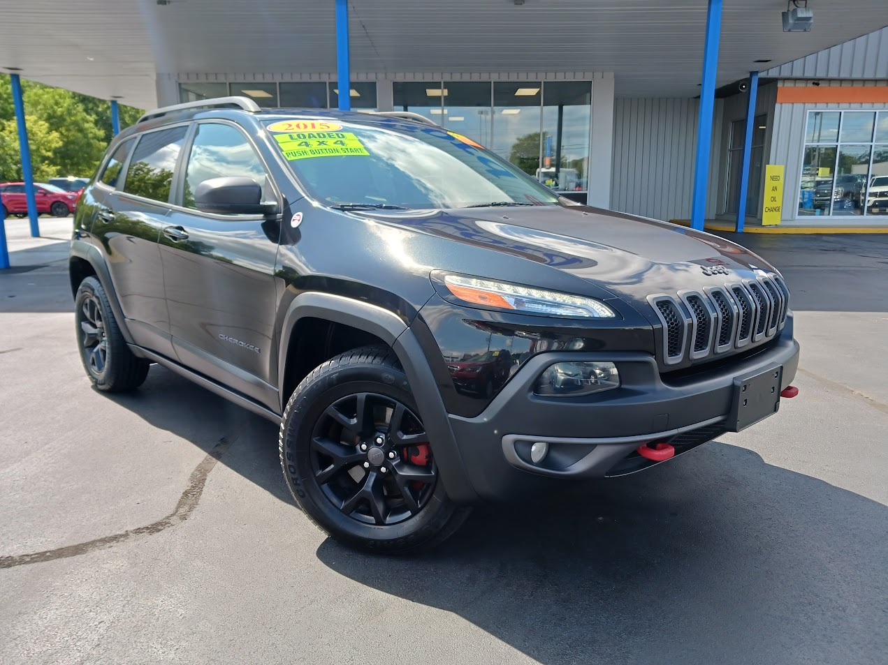 Used 2015 Jeep Cherokee Trailhawk with VIN 1C4PJMBS4FW735524 for sale in Albion, MI