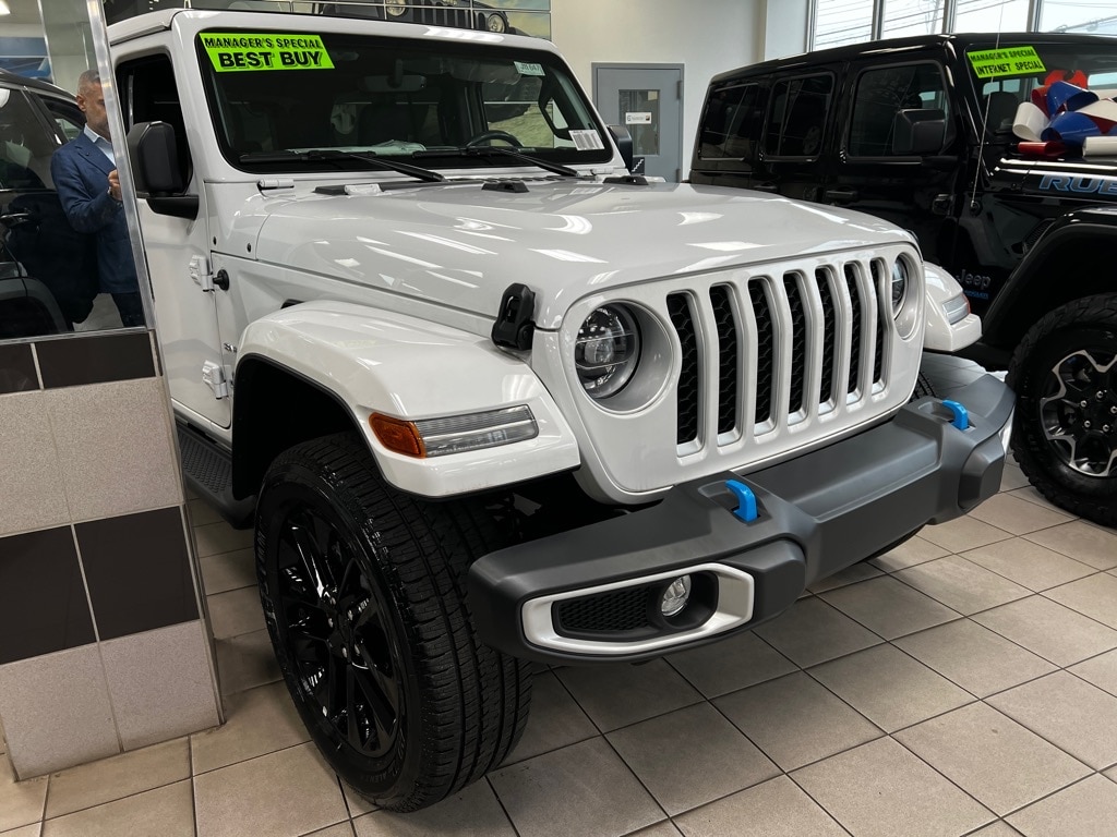 Used 2022 Jeep Wrangler Unlimited Sahara 4XE with VIN 1C4JJXP65NW272116 for sale in Larchmont, NY