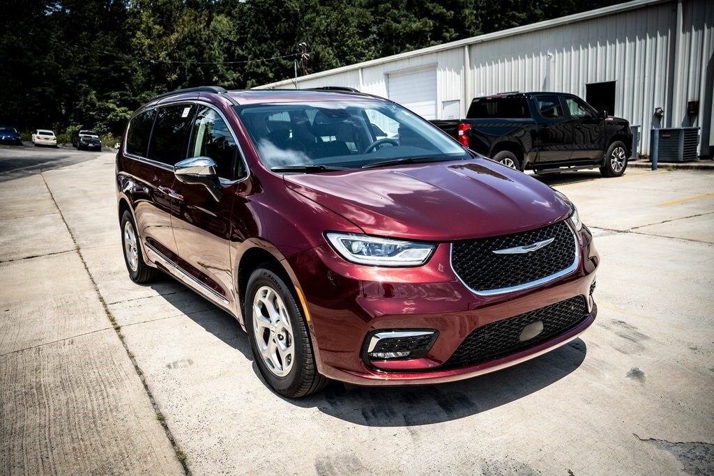 red Chrysler Pacifica parked at All American CDJR in Oneonta, AL