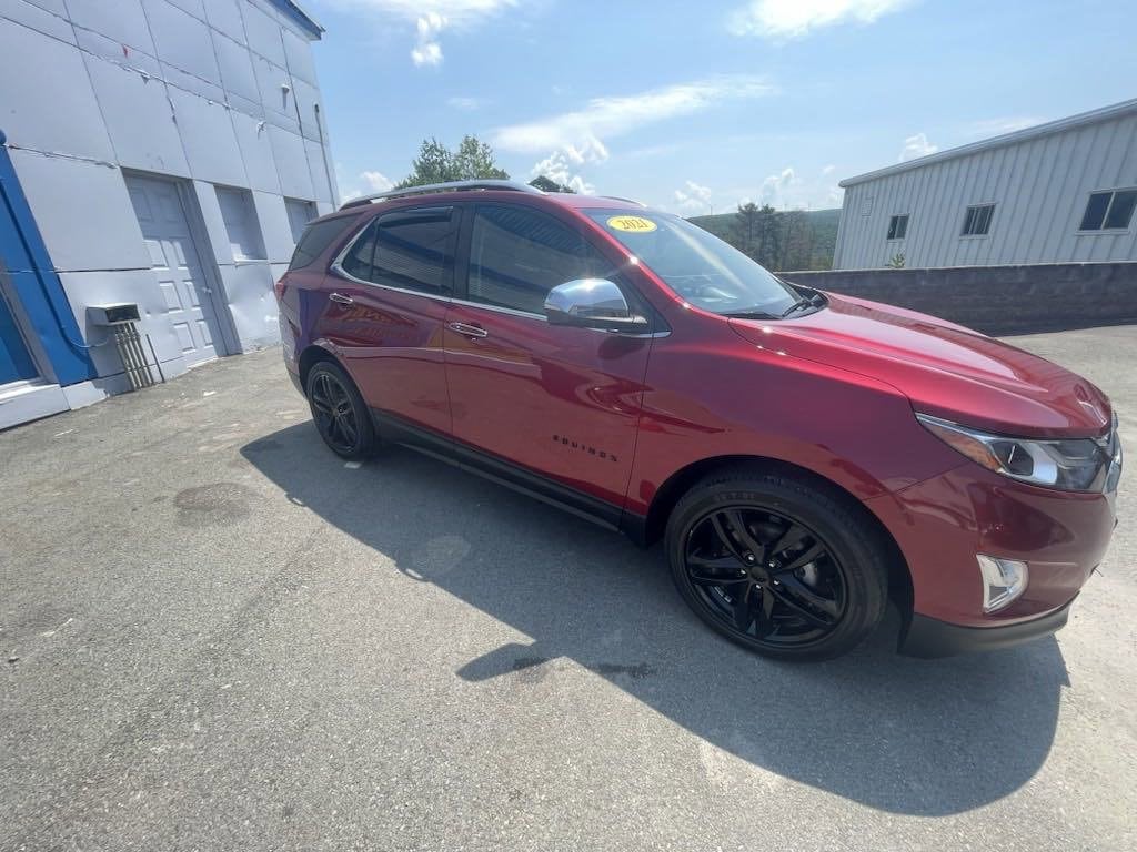 Used 2021 Chevrolet Equinox Premier with VIN 2GNAXXEV9M6156720 for sale in Forest City, PA