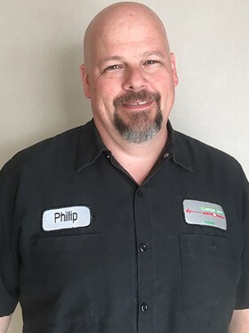 Staff member Phillip George from ID_b9e38e3f4224