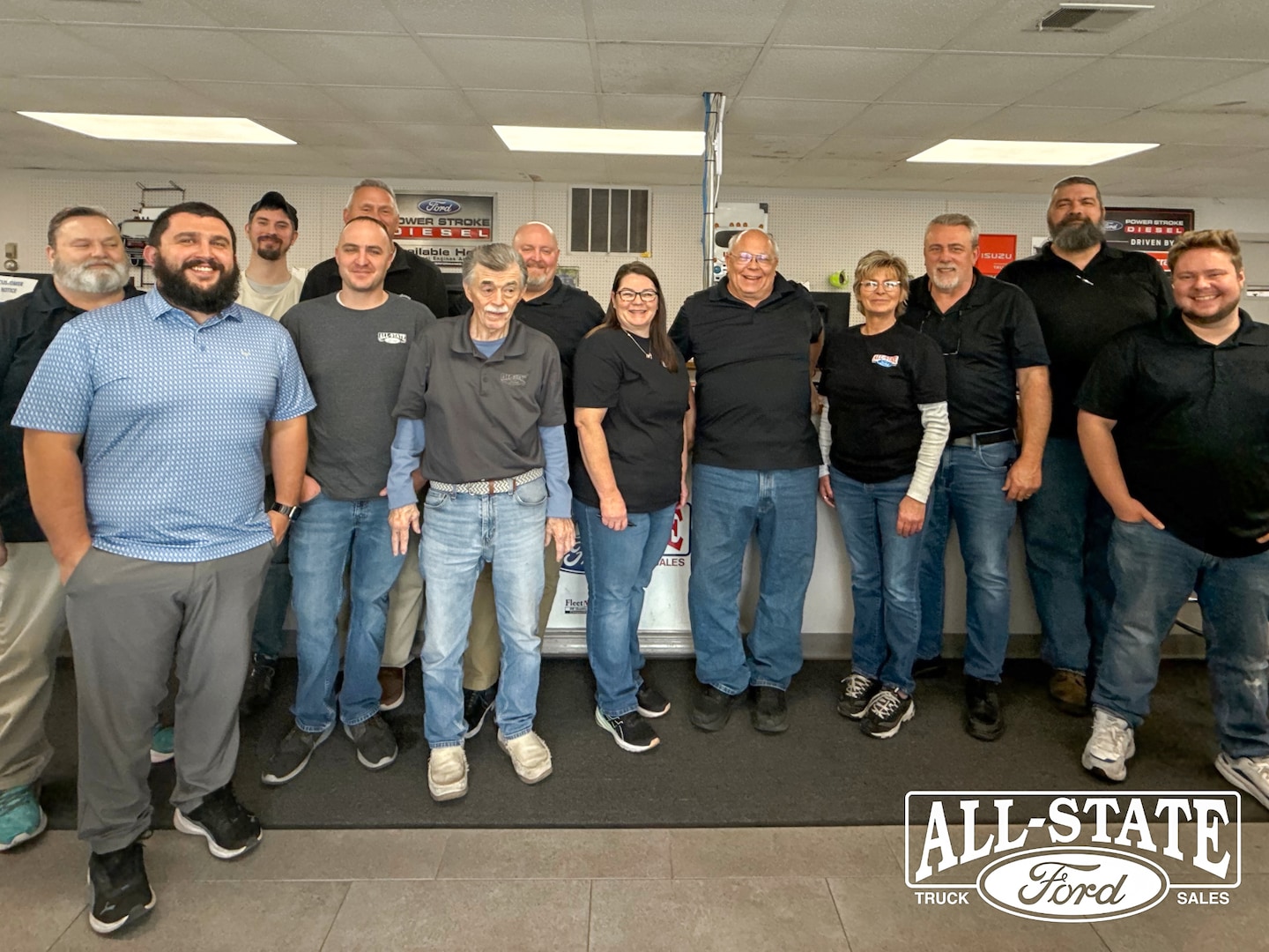  Person cheerfully signing documents.