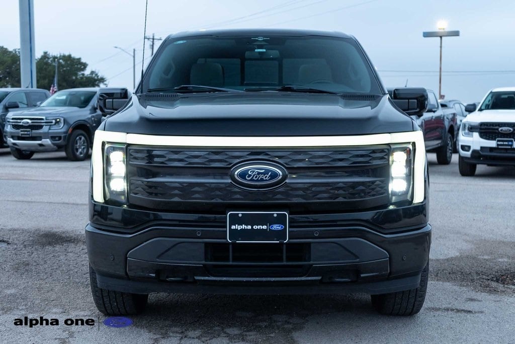 Used 2023 Ford F-150 Lightning Platinum with VIN 1FT6W1EV8PWG16913 for sale in La Grange, TX