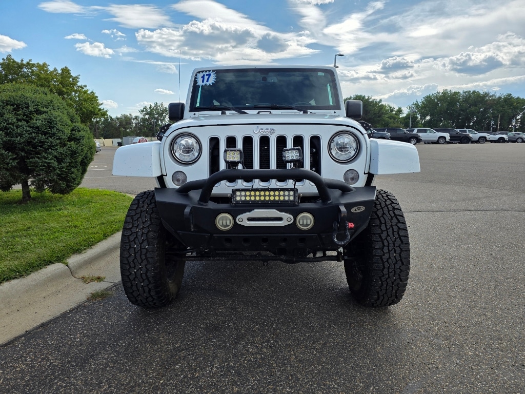 Used 2017 Jeep Wrangler Unlimited Sahara with VIN 1C4BJWEG9HL616448 for sale in Glendive, MT