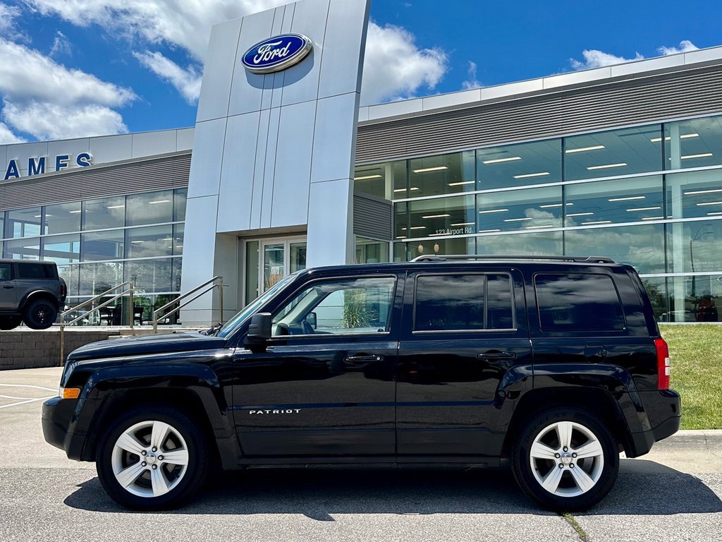 Used 2014 Jeep Patriot Latitude with VIN 1C4NJPFB9ED916406 for sale in Ames, IA