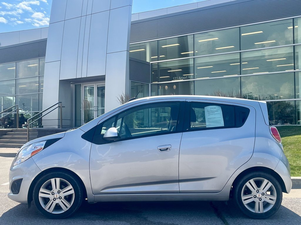 Used 2015 Chevrolet Spark 1LT with VIN KL8CD6S99FC731140 for sale in Ames, IA