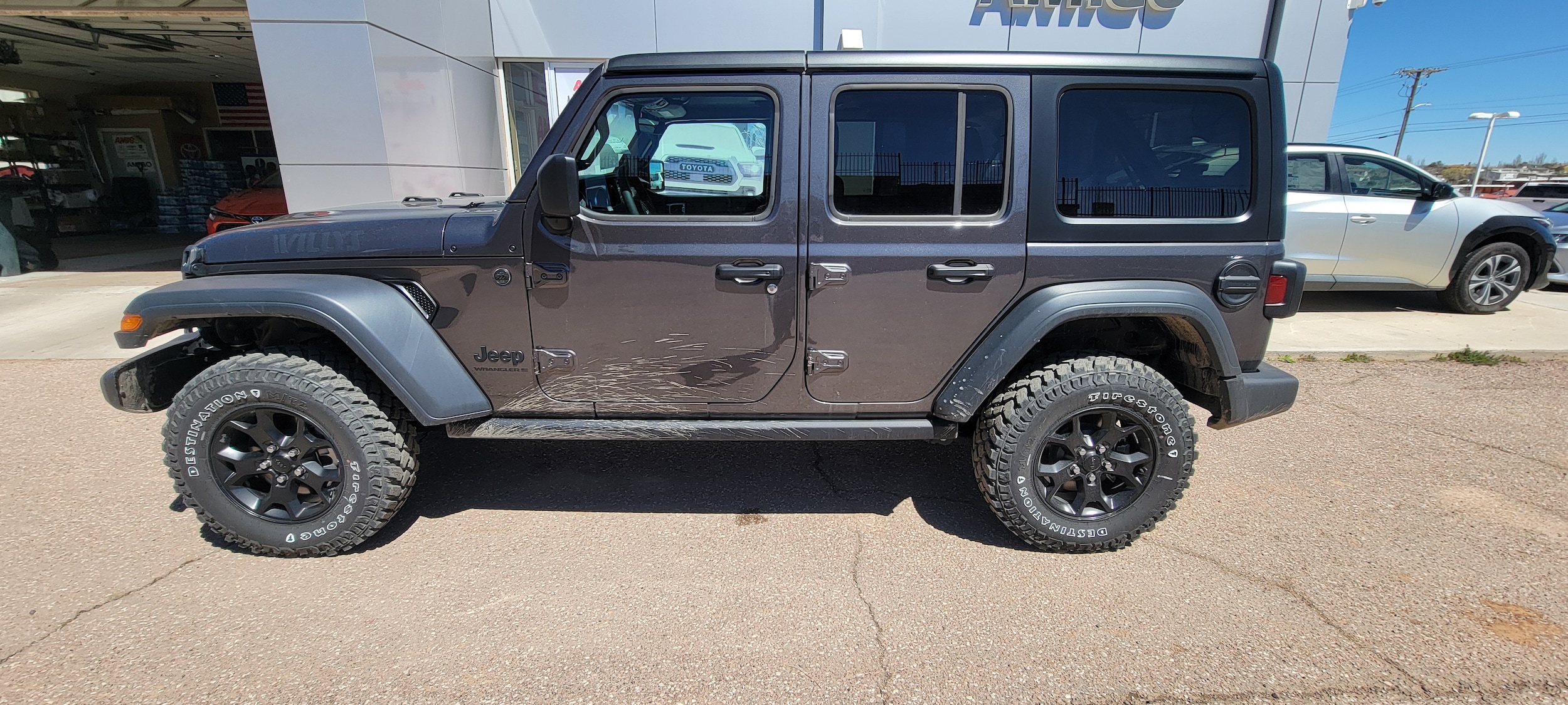Used 2023 Jeep Wrangler 4-Door Willys with VIN 1C4HJXDM0PW578919 for sale in Gallup, NM