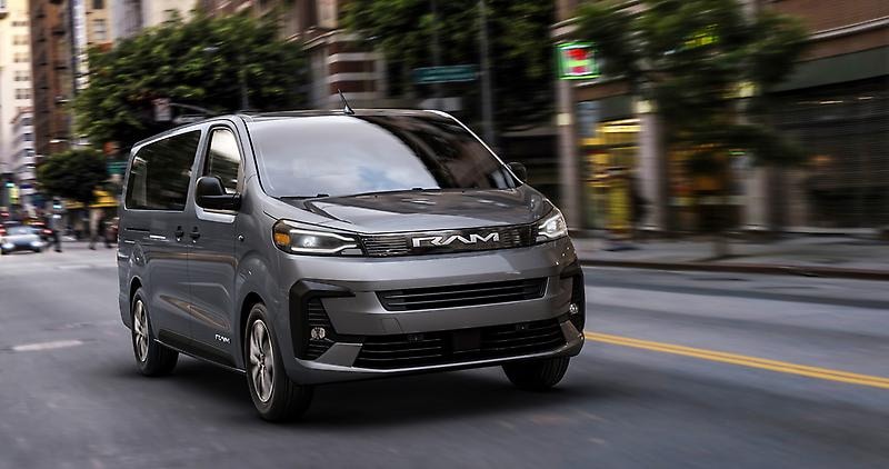 2027 RAM ProMaster City driving through city, available at A.M. Maus & Son.