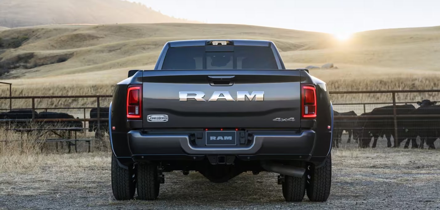 2027 RAM 3500 trunk view with cows in the pasture