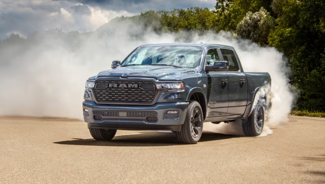 2026 RAM 1500 Rebel X on dirt road.