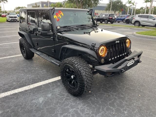 Used 2016 Jeep Wrangler Unlimited Sport S with VIN 1C4BJWDG4GL123311 for sale in Naples, FL