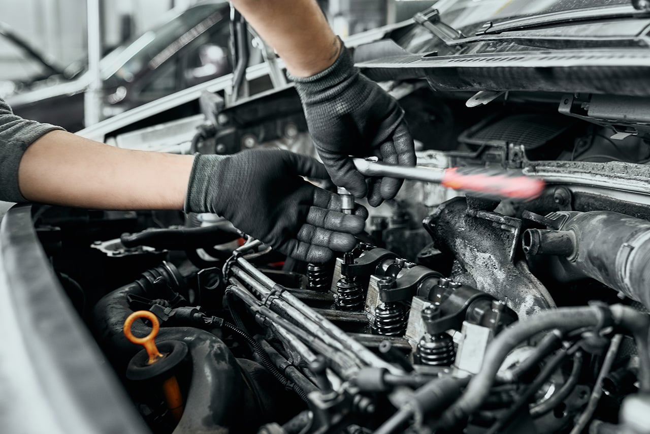 Technician installing Hyundai auto parts