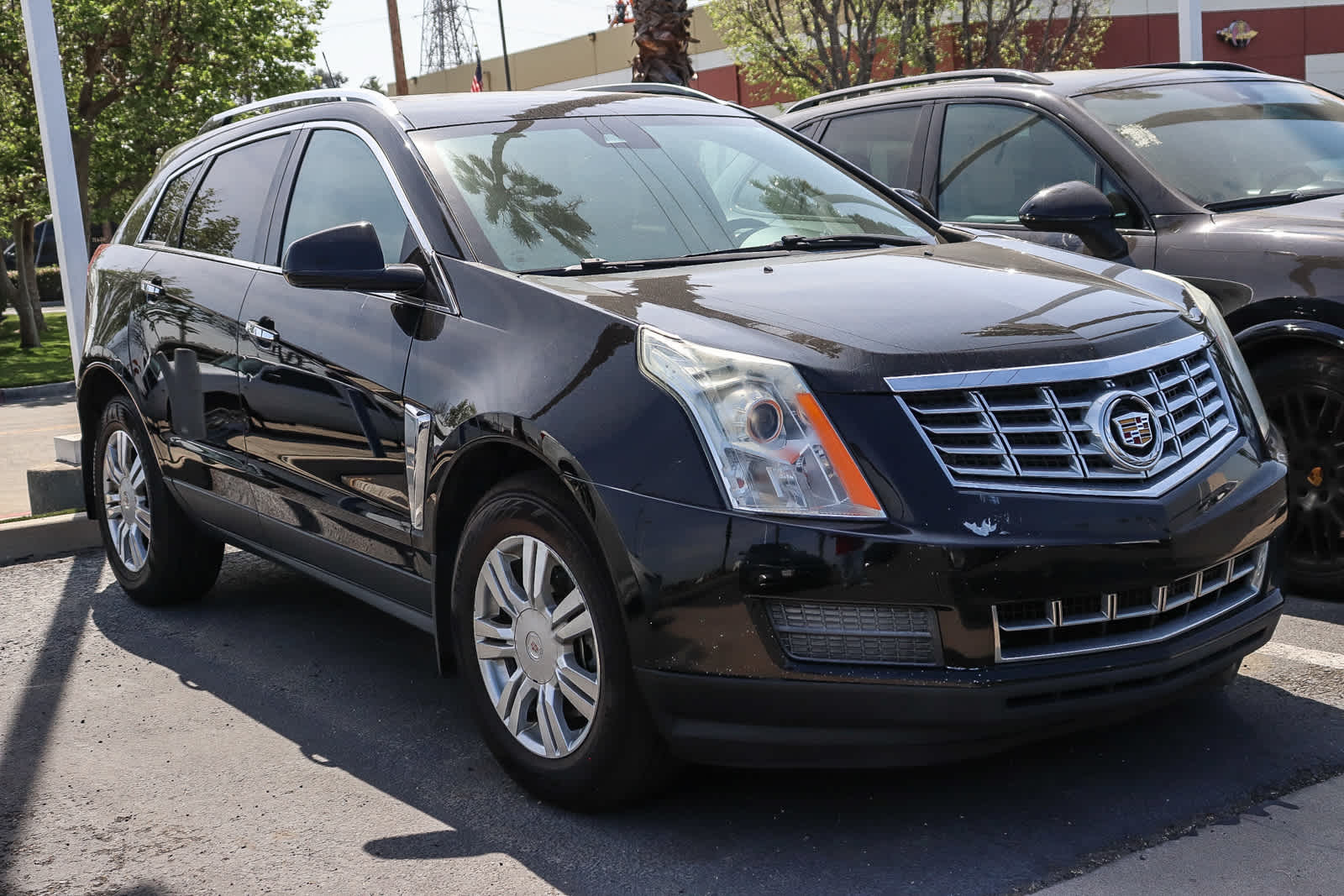 Used 2014 Cadillac SRX Luxury Collection with VIN 3GYFNBE36ES650620 for sale in Anaheim, CA