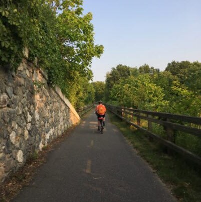 Cycler enjoying the Blackstone River Bikeway in Bellingham MA