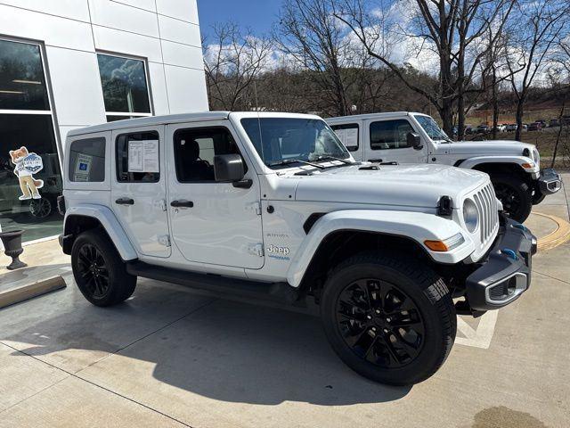 Used 2022 Jeep Wrangler Unlimited Sahara 4XE with VIN 1C4JJXP66NW153264 for sale in Franklin, NC