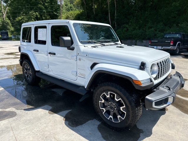 Used 2024 Jeep Wrangler 4-Door Sahara with VIN 1C4PJXEG9RW237977 for sale in Franklin, NC