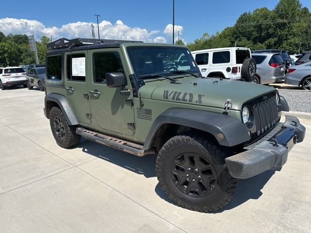 Used 2016 Jeep Wrangler Unlimited Willys Wheeler with VIN 1C4HJWDG9GL110287 for sale in Franklin, NC