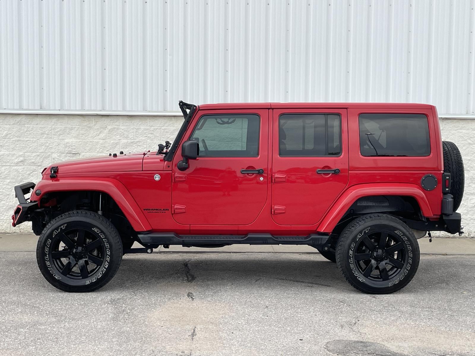 Used 2014 Jeep Wrangler Unlimited Sahara with VIN 1C4HJWEG8EL164546 for sale in Lincoln, NE