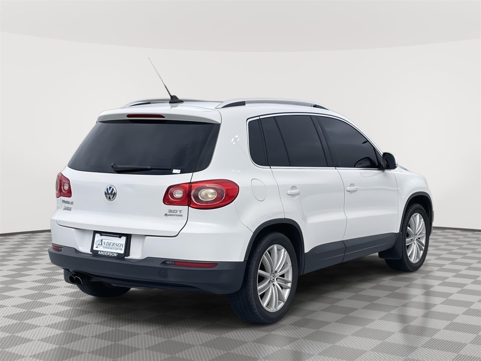 Used 2011 Volkswagen Tiguan SEL with VIN WVGBV7AX1BW521612 for sale in Grand Island, NE