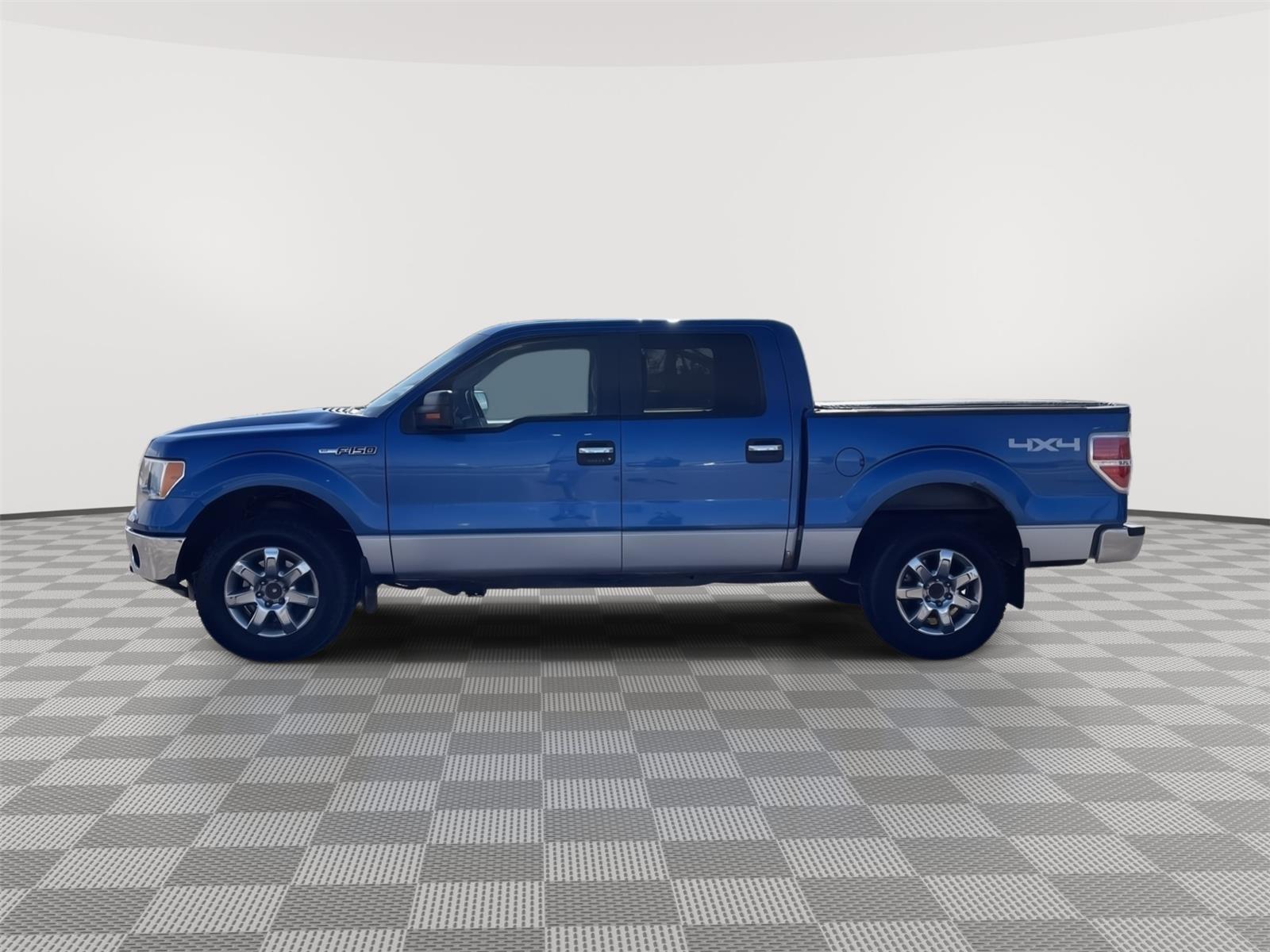 Used 2013 Ford F-150 XLT with VIN 1FTFW1EF9DKG28421 for sale in Grand Island, NE