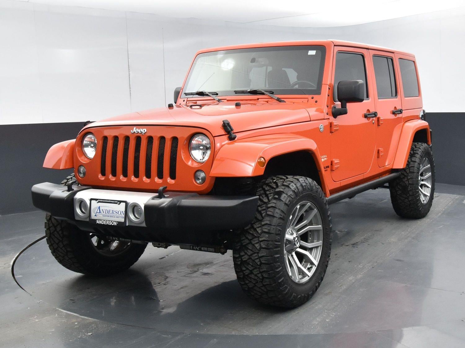 Used 2015 Jeep Wrangler Unlimited Sahara with VIN 1C4BJWEG8FL619547 for sale in Grand Island, NE