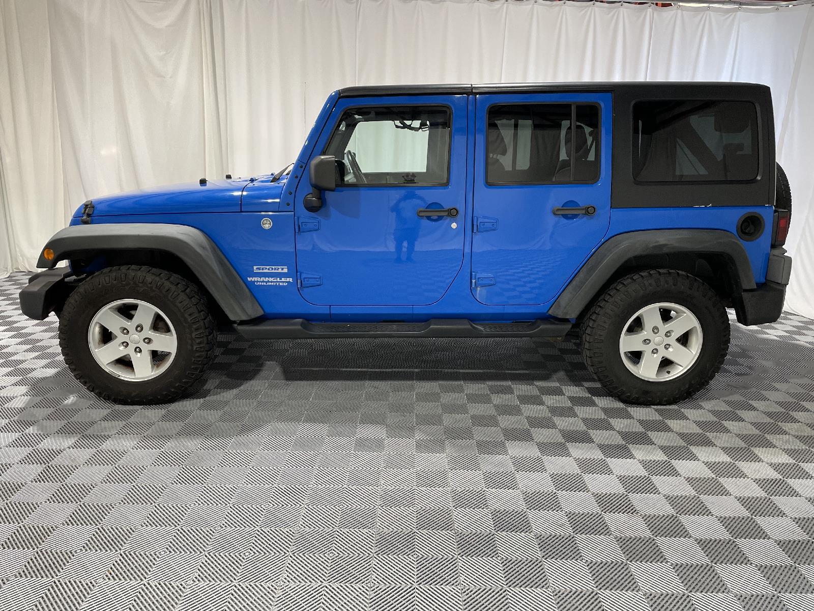 Used 2011 Jeep Wrangler Unlimited Sport with VIN 1J4BA3H12BL530776 for sale in Saint Joseph, MO