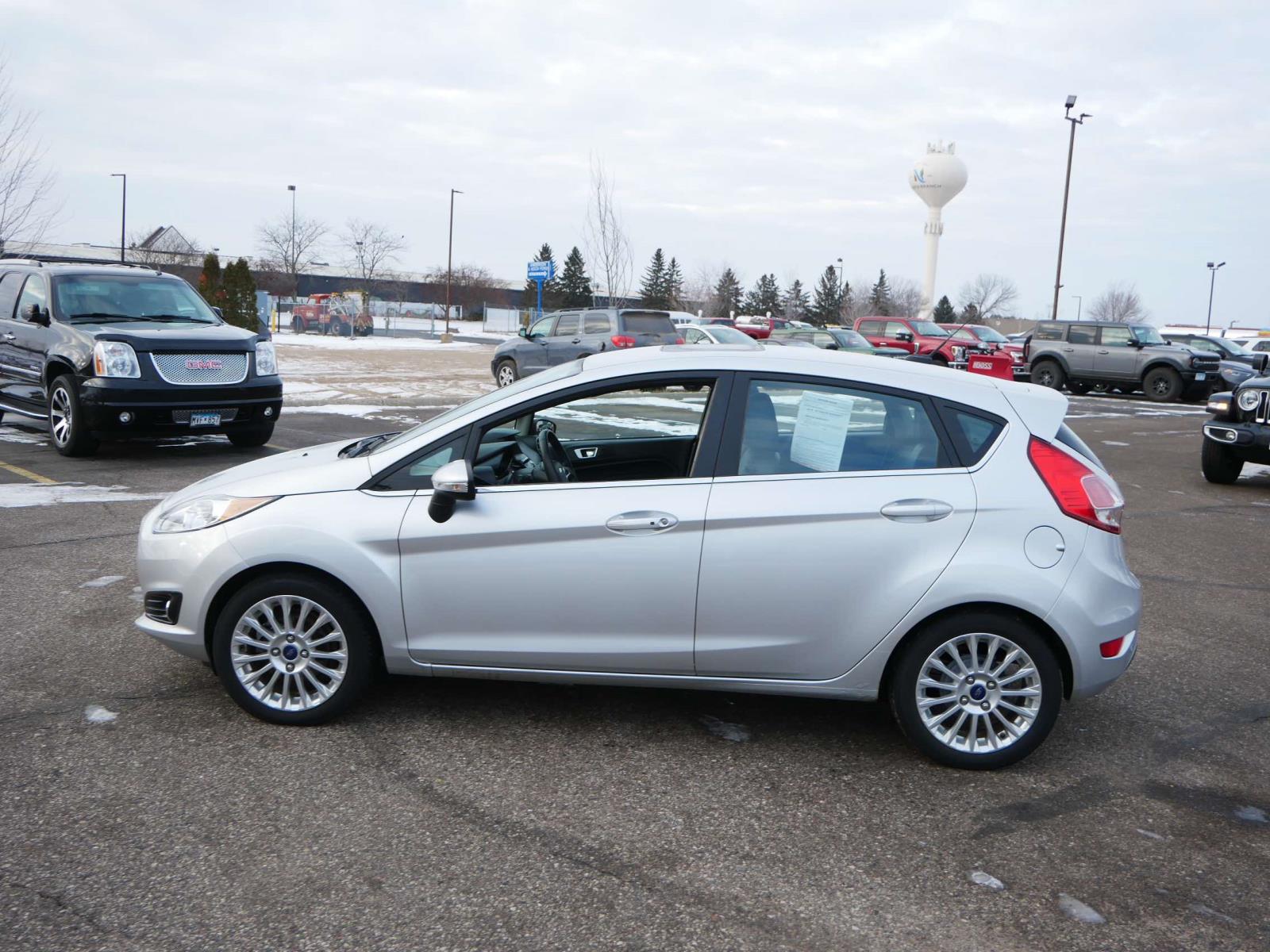 Used 2014 Ford Fiesta Titanium with VIN 3FADP4FJ4EM199732 for sale in Branch, Minnesota