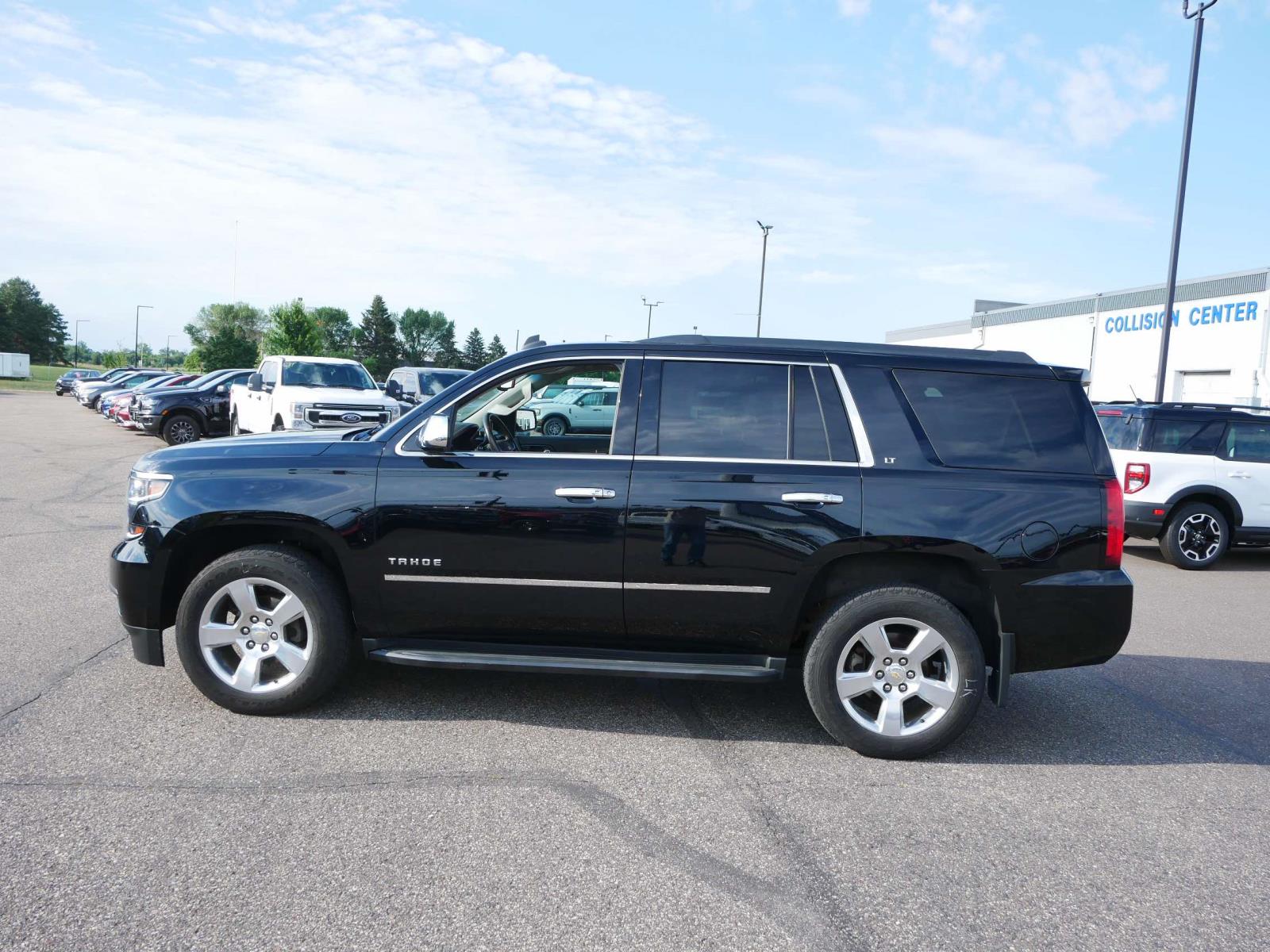 Used 2015 Chevrolet Tahoe LT with VIN 1GNSKBKC5FR284582 for sale in Branch, Minnesota