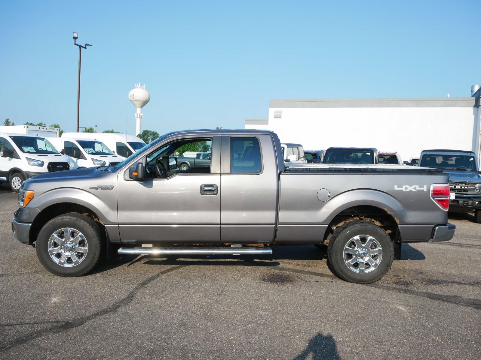 Used 2014 Ford F-150 Lariat with VIN 1FTFX1EFXEFC65134 for sale in Branch, Minnesota