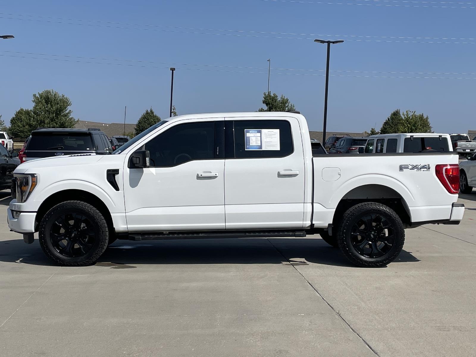 Used 2022 Ford F-150 XLT with VIN 1FTFW1E82NFA93749 for sale in Lincoln, NE