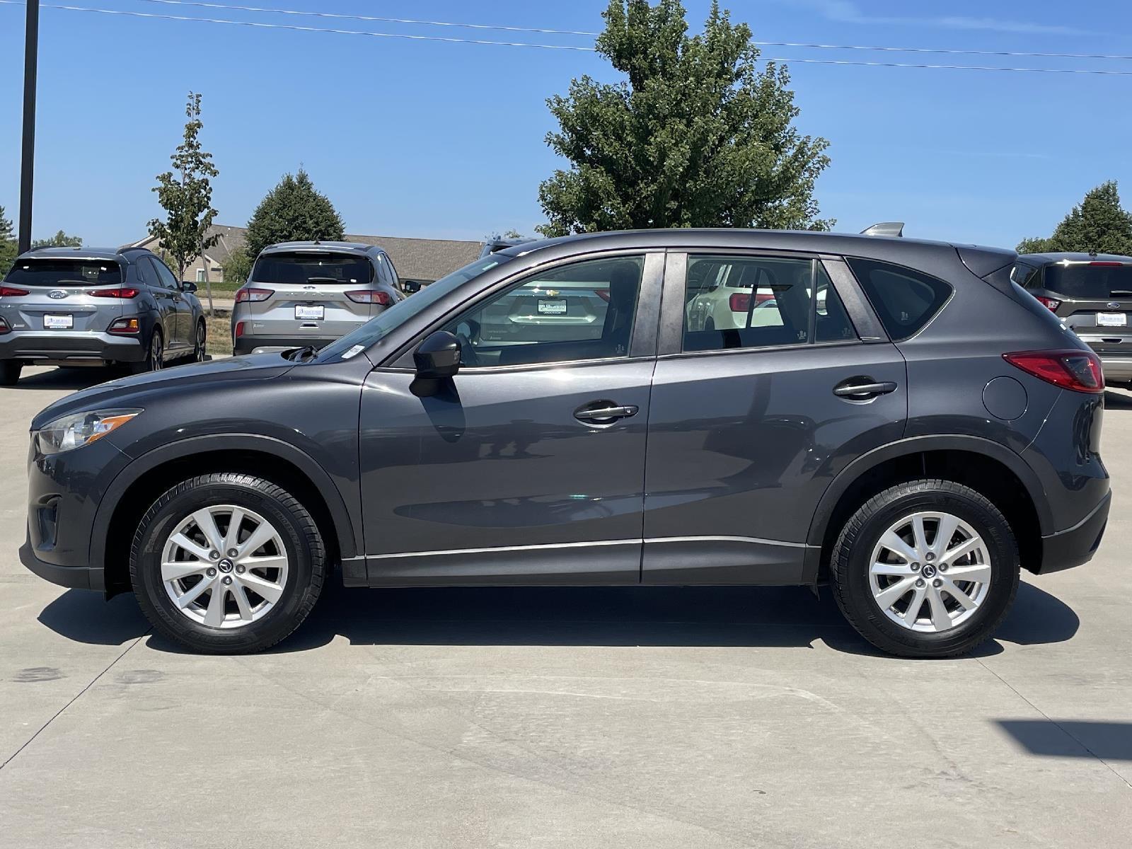 Used 2014 Mazda CX-5 Sport with VIN JM3KE4BE0E0338877 for sale in Grand Island, NE