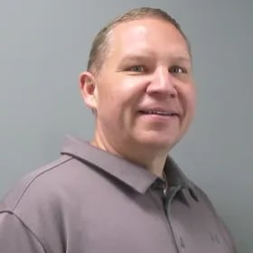 Staff member Gregg Decman from 8ff479e75077