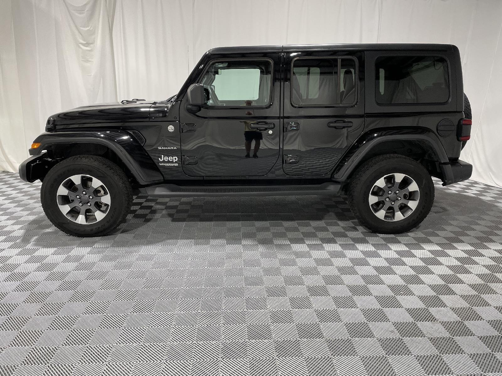 Used 2022 Jeep Wrangler Unlimited Sahara with VIN 1C4HJXEM0NW244692 for sale in Saint Joseph, MO