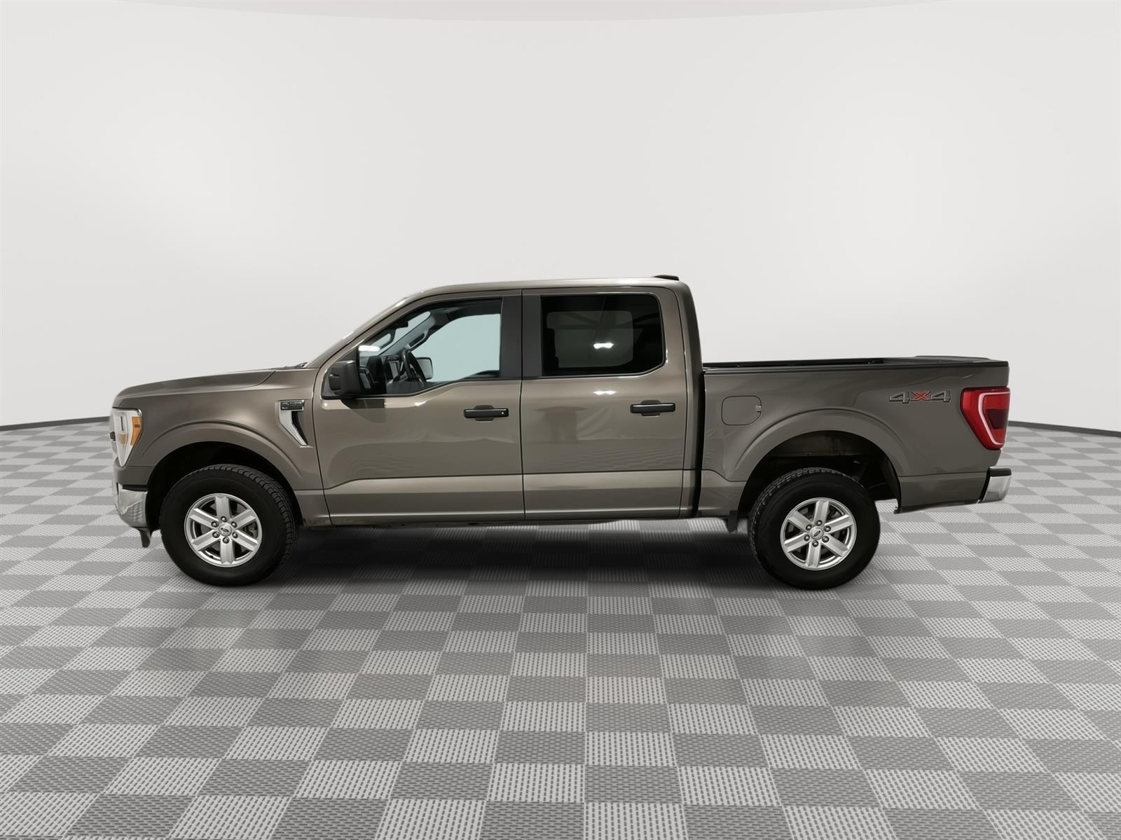 Used 2022 Ford F-150 XLT with VIN 1FTFW1E82NFB47633 for sale in Kansas City