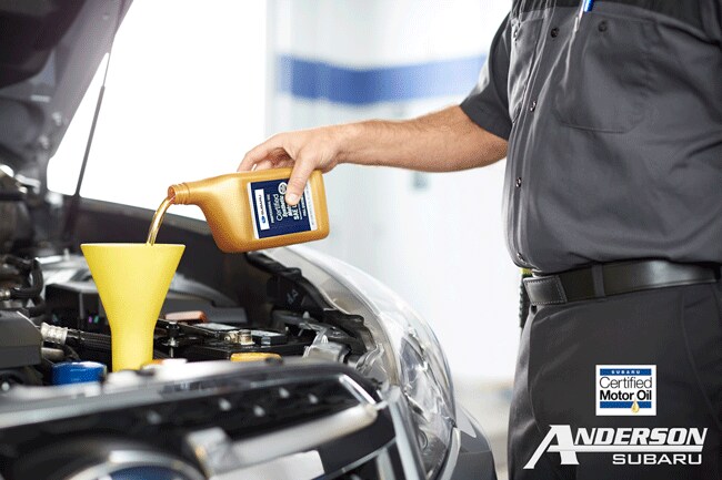Subaru-Certified-Motor-Oil-Tech-with-Oil.png