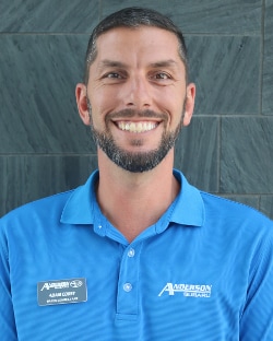 Staff member Adam Corey from 32e153e8b28c