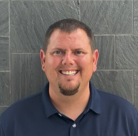 Staff member Ryan Brummet from 32e153e8b28c