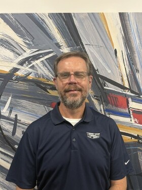 Staff member Rusty Reid from ID_b70af4ea8322