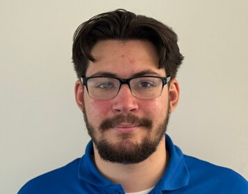 Staff member Jett McMillion from ID_49f4e2